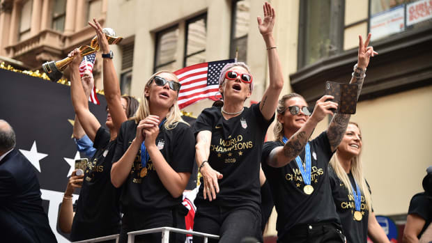 uswnt-parade-rapinoe-trophy-nyc.jpg